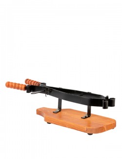 Ham holder made of wrought iron with wood base