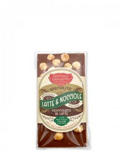Bar of milk chocolate with whole hazelnuts
